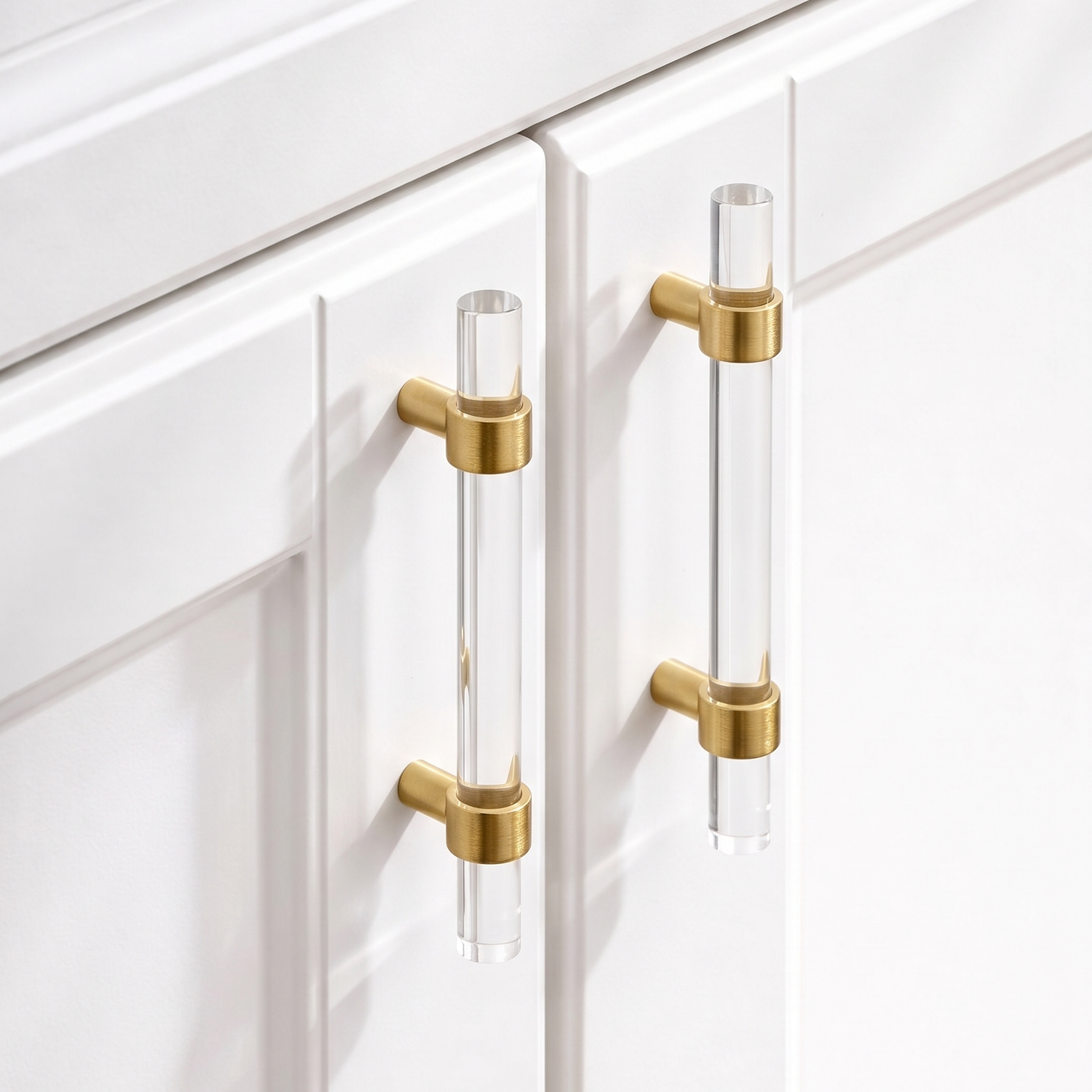 A teardrop-shaped brass cabinet pull in a gold finish, designed for cabinetry hardware applications and available from Hometouch.