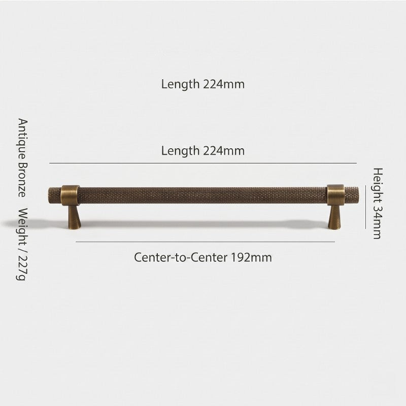 A Hometouch cabinet handle with a warm yellow-toned brass finish and T-shaped profile, presented in high-resolution studio photography against a neutral backdrop for furniture hardware specification and interior design asset libraries.