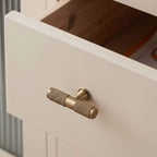 The Hometouch cabinet pull in antique brass features a curved ergonomic profile designed for contemporary kitchen and wardrobe hardware installations requiring durable metallic finishes.