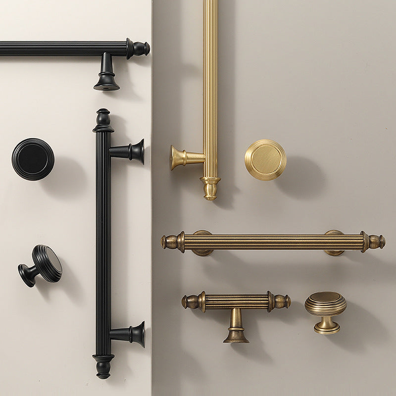 Hometouch handle in antique gold brass with a striped rectangular profile, designed as a cabinet pull for furniture hardware, available at www.hometouchware.com.