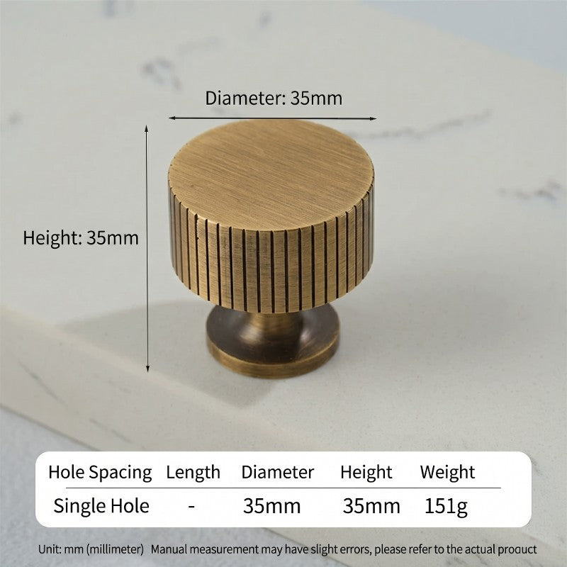 Hometouch's brass cabinet pull features an antique gold finish and a T-bar profile, designed as contemporary hardware for furniture and cabinetry applications.