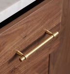 Hometouch handle crafted from brass with a gold finish, featuring a teardrop-shaped cabinet pull designed for furniture hardware applications, available at www.hometouchware.com.