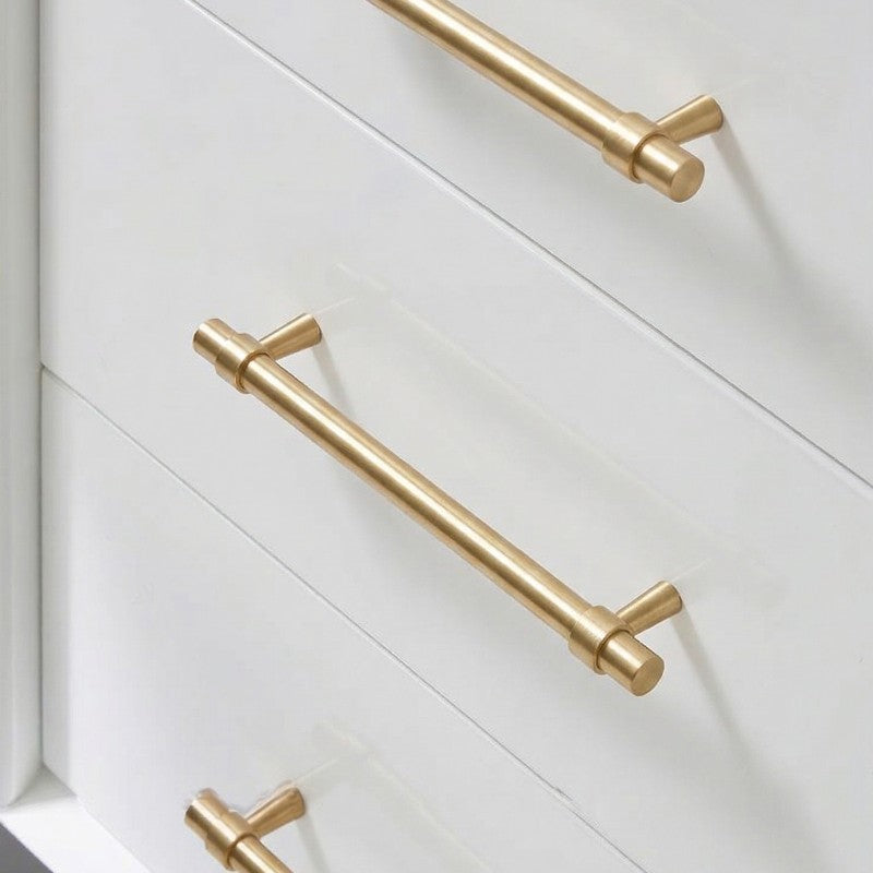 A brass cabinet pull in a teardrop shape with a gold finish, designed for furniture and cabinetry hardware applications, sourced from Hometouchware.