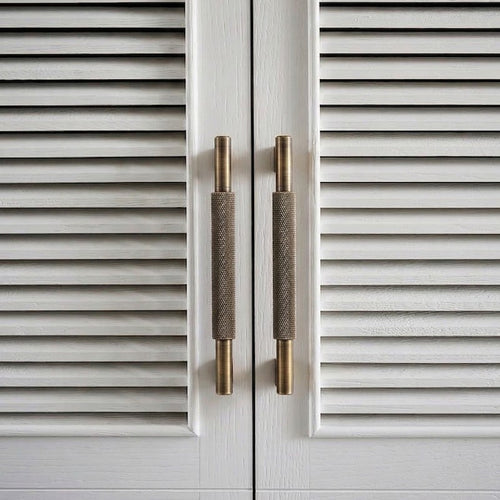 A teardrop-shaped brass cabinet pull in a warm gold finish, designed for furniture and cabinetry hardware with a sleek modern aesthetic suitable for interior design and home improvement projects.