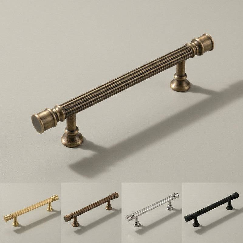 A brass-finished pull handle for furniture or cabinetry, presented in a clean product shape against a neutral background for use in hardware catalogs or interior design material libraries.