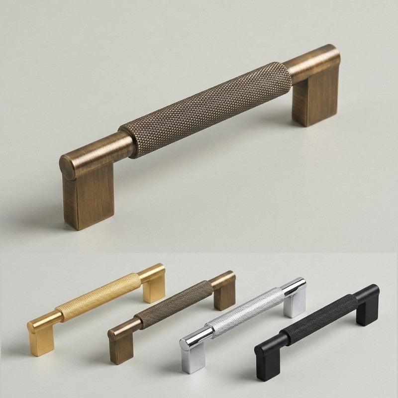 A Hometouch pull handle in a brass finish features a sleek, elongated rectangular shape with a gently curved profile, presented in a clean product photography style suitable for hardware catalogs or interior design applications.
