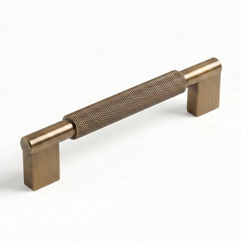 Hometouch's brushed brass rectangular cabinet pull features a durable textured finish and clean linear silhouette designed for contemporary kitchen cabinetry and furniture hardware installations.