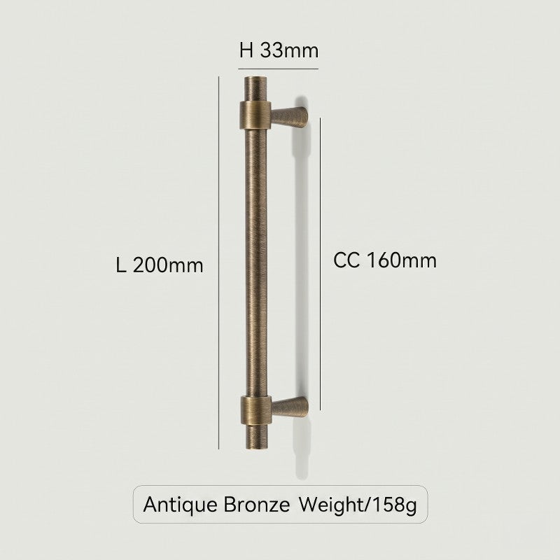 A Hometouch oval cabinet pull features an antique brass finish designed for contemporary furniture hardware applications.