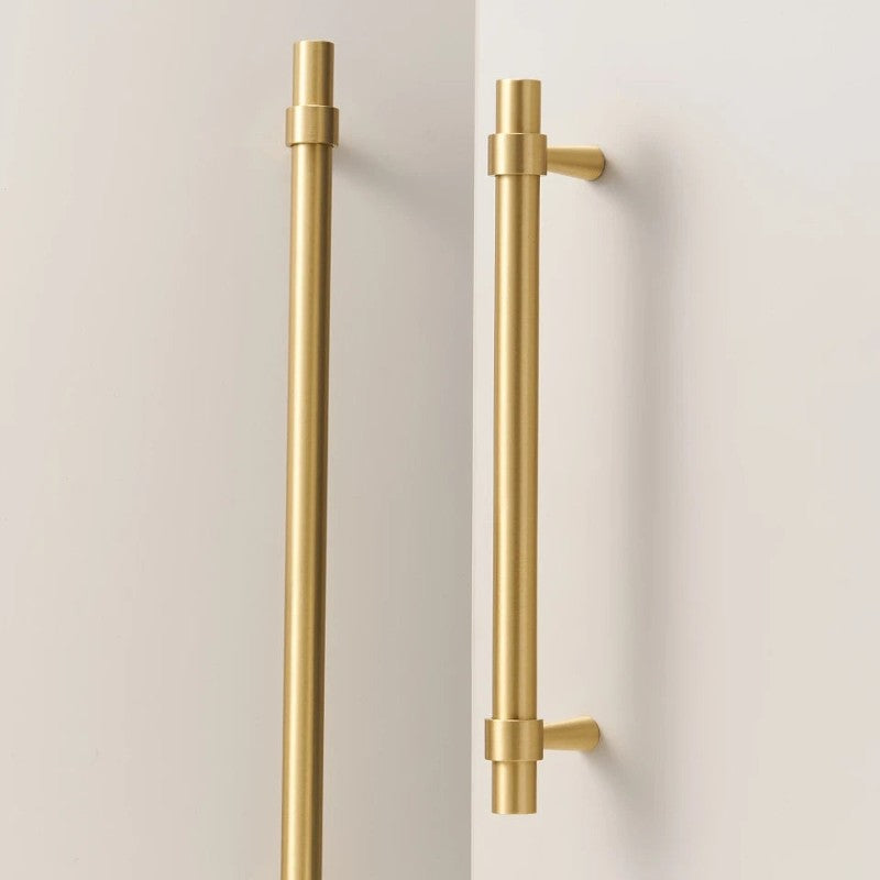 A brass cabinet pull with a stepped ring design in a gold finish, suitable for furniture or cabinetry hardware applications.