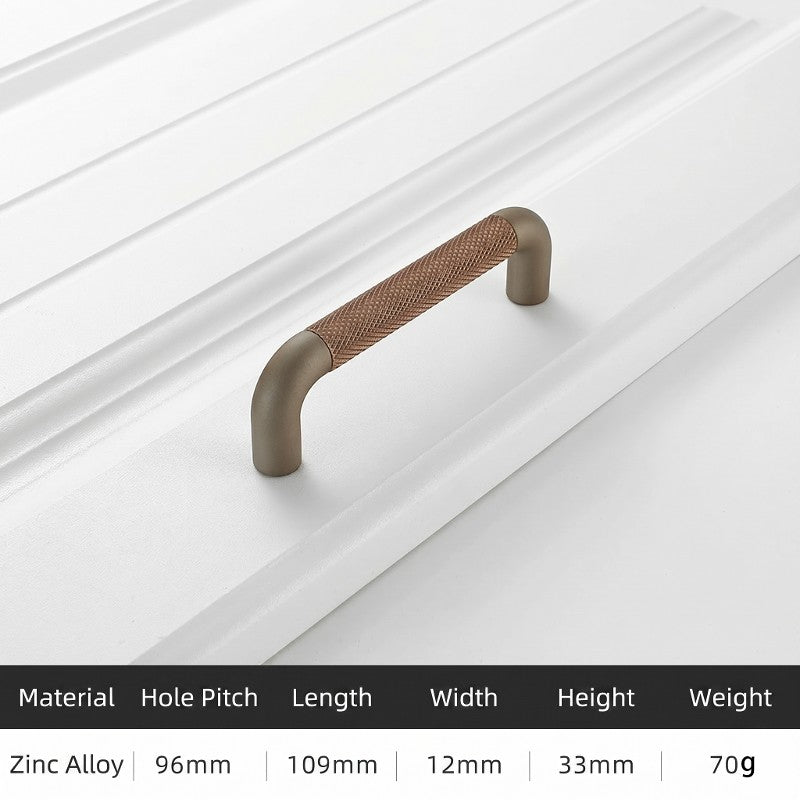 A Hometouch curved cabinet pull crafted in warm gold brass finish, featuring a smooth organic profile ideal for modern cabinetry hardware applications.