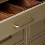 Hometouch's polished brass oval cabinet handle photographed in crisp product style for furniture hardware catalogs and e-commerce applications.