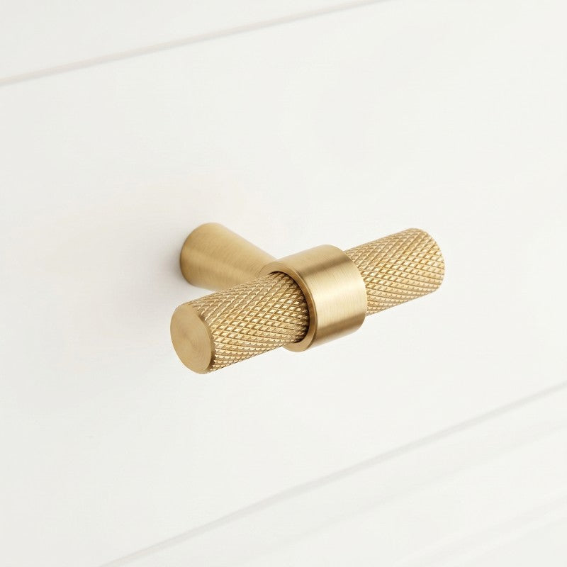 Hometouch hardware handle knobs in brass with a matte finish designed for kitchen cabinet hardware, presented in clean product photography suitable for e-commerce and interior design contexts at www.hometouchware.com.